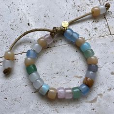 These bracelets and necklaces are a collection based around a rainbow of gemstone pony beads. Add-on stones can be purchases additionally here, please specify if you want your add on strung on your bracelet in the personalization comments. If left blank it will be sent separately: https://www.etsy.com/listing/946252171/bracelet-add-ons?ref=shop_home_active_4 All of my cords are one size fits all. Stones are subject to availability and may be substituted when necessary. Precious gems are formed i Pony Bead Bracelets, Glass Bead Bracelet, Bracelets And Necklaces, Gemstone Beaded Bracelets, Pony Beads, Add Ons, Precious Gems, Gemstone Bracelet, Bead Bracelet