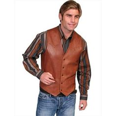 Features Lambskin button front vest Single point yokes front & back 5-button front Two front welt pockets One inside pocket Acetate lining Collection - Men's Leather Wear Gender - Men Size - 52-B Color - Antique Brown Material - 100% Leather Made in India Item Weight - 0.94 lbs. - SKU: SCLY4935 Gender: male.  Age Group: adult. Mens Western Vest, Leather Vests, Western Vest, Leather Outerwear, Lambskin Leather Jacket, Traje Casual, Mens Vests, Leather Wear, Winter Tops