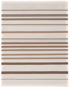 a white and brown striped rug on a white surface with lines in the middle,