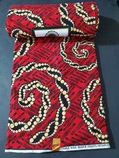 DESCRIPTION Red, Beige and Black African Ankara Fabric. This is high quality African print is 100% cotton and it's 45 inches wide. It is used for making African Clothing, African quilts, & For Home decoration. FYI: Print is Double sided. The listing is for 2yards, 3yards, 6yards and Headwrap Each piece of fabric measures: 70-72in by 45in for 2yards 105-108in by 45in for 3yards 210-216in by 45in for 6yards 70in by 22in for Head wrap If you purchase more than one yard, you will receive one continuous piece. *If you require more than what I have listed, feel free to send me email. CARE INSTRUCTIONS:•DO NOT BLEACH•Hand wash with cold water and mild soap or Dry clean•Press with warm iron on the wrong side only. Color may be different due to your monitor Red Fabric With Unique Traditional Pattern, Red Traditional Block Print Fabric, Traditional Red Block Print Fabric, Traditional Cotton Batik Fabric, Traditional Red Ankara Fabric, Red Batik Print Cotton Fabric, Red Cotton Fabric With Batik Print, Red Cotton Fabric With Traditional Patterns, Red Ankara Fabric With Traditional Patterns