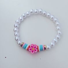 Handmade Tropical Flower Charm Bracelets Is Cute For Women’s Girl, I Can Adjust The Size Adjustable White Jewelry With Flower Decoration, Coconut Girl Bracelet Ideas, White Stretch Bracelet For Beach In Spring, White Stretch Bracelet For Beach Spring Season, Cute White Summer Jewelry, White Beaded Bracelets With Flower Charm For Spring, Cute Flower Jewelry For The Beach, Handmade Trendy White Pearl Bracelet, Handmade White Pearl Trendy Bracelet