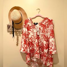 Perfect For Beach Getaways, Or Even Over A Pair Of Leggings. Red Printed Vacation Top, Red Long Sleeve Blouse For Vacation, Red Summer Blouse For Brunch, Summer Vacation Red Blouse, Red Summer Blouse For Vacation, Printed White Blouse For Vacation, Red Long Sleeve Beach Blouse, White Printed Blouse For Vacation, Red Floral Print Blouse For Brunch