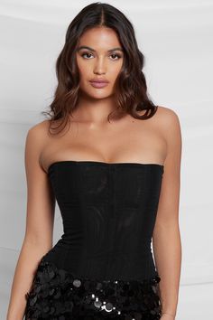 Meet our Muse Mesh Corset Top - a modern sleek black mesh corset top with simple flattering vertical wire boning. Designed to sculpt and shape, this corset top features a double layered non-stretch mesh material providing an extreme high level of support to lift your bust and cinch your waist.Featuring a rounded hemline, back zipper and a strapless neckline, our Muse Mesh Corset Top does not disappoint. If you are looking for the perfect black corset top that will go with (literally) anything, t Black Mesh Corset, Satin Corset Top, High Waist Long Skirt, Black Corset Top, Mesh Corset, Strapless Corset, Black Corset, Edgy Look, Trendy Tops