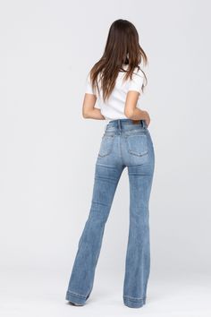 Introducing the Jesse Mid Rise Flare Jeans! These stylish jeans are just what you need to take your outfit to the next level. With a medium-wash and mid-rise fit, these jeans will hug your curves for the perfect look. Add some flare to your wardrobe today! 66% Cotton, 12% Rayon, 21% Polyester, 1% Spandex Inseam: 33" Rise: 10" Luxury Denim Mid-rise Flares, Midrise Jeans Women, Bootcut Jeans Highwaist, Flare Jeans 30 Inch Inseam, Luxury Mid-rise Flare Jeans For Fall, Luxury Mid-rise Dark Wash Flare Jeans, Luxury Blue Flare Jeans With Relaxed Fit, Luxury Medium Wash Mid-rise Flare Jeans, Straight Leg Boot Cut Jeans