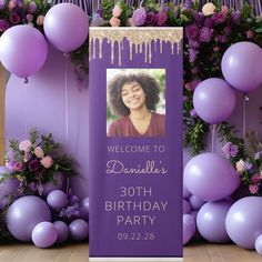 a purple birthday party sign with balloons and streamers in the background that reads, welcome to danielle's 30th birthday party