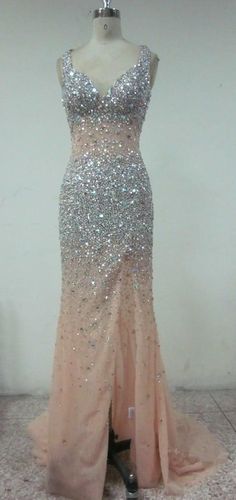 There are beaded sheer evening gown dresses in our collection that were made with #Swarovski #Crystals.  This sleeveless #design has a v-neck and a sheer bodice.  All of our #eveninggowns can be made with any changes.  We have many other #eveningdresses in our catalog you can consider as well. Or we can make #custom #pageant #dresses for you based on any of your prefernces.  If you have a picture of an #eveningdress you #love we can make a #replica of it for you as well. Contact us for info. Glitz Pageant, Nude Gown, Pageant Gown, Formal Ball Gown, V Neck Wedding Dress, Evening Gown Dresses, Pageant Gowns, Ball Gowns Evening, Beaded Gown