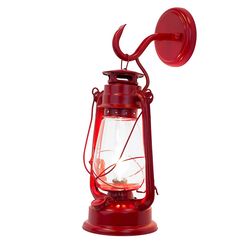 a red lantern with a light on it's side and a hook in the middle