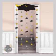 a door decorated with stars and a graduation cap