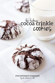 two chocolate crinkle cookies and a glass of milk