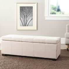 a white bench sitting on top of a carpeted floor