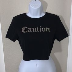 Eye-Catching Black Cropped Tee That Reads 'Caution' Across The Front In Multicolored Rhinestones // Like New Condition, Unworn // Size Large // Shein Brand // Smoke Free Home Black Rhinestone T-shirt For Streetwear, Fitted Black T-shirt With Rhinestones, Casual Fitted Tops With Rhinestones, Fitted Casual Top With Rhinestones, Fitted Casual Tops With Rhinestones, Rhinestone Crew Neck Tops For Streetwear, Crew Neck Rhinestone Tops For Streetwear, Streetwear Crew Neck Tops With Rhinestones, Crew Neck Tops With Rhinestones For Streetwear