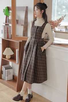 Our Sorrell Dark Academia Plaid Wool Pinafore Dress is perfect for stepping back into the golden age of learning and literature. Crafted with a sumptuous wool blend, this elegant pinafore dress is designed with a timeless plaid pattern and a chic, adjustable belt, creating a distinctive academia look perfect for enchanting dark academia evenings. (Top not included) Dark Academia Outfits, Dark Academia Outfit, Academia Outfits, Academia Clothes, Academia Style, Cottagecore Outfits, Academia Fashion, Cottagecore Fashion, Outfit Pink