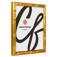 a gold frame with the letter g in black and white on it, against a white background