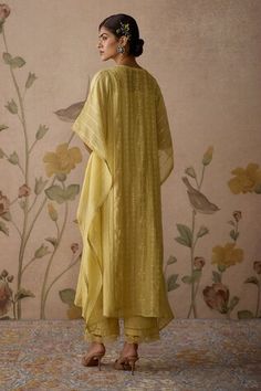 Lemon yellow kaftan with thread, sequin and floral embroidery. Comes with cotton pant with lace detailing and a slip. - Aza Fashions Spring Yellow Palazzo Set With Resham Embroidery, Spring Yellow Anarkali Set With Chikankari Embroidery, Spring Yellow Chanderi Anarkali Set, Yellow Palazzo Set With Zari Work For Spring, Yellow Chikankari Embroidery Kaftan, Yellow Sharara With Chikankari Embroidery For Spring, Yellow Anarkali Set For Spring, Yellow Bollywood Palazzo Set For Spring, Yellow Sharara With Resham Embroidery For Spring