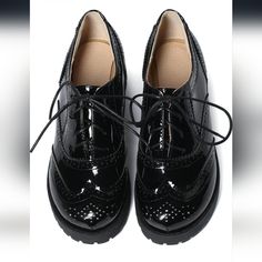 Women's Lace Up Wingtip Oxford. Platnum Chunky Heel. Vintage Round Toe Brogue Shoe. Us Size 8. Never Worn. Ordered Next Size Up And Never Returned These. Love Mine. Black Patent Leather Low-top Lace-up Shoes, Black Lace-up Oxfords For Party, Black Patent Leather Wingtip Lace-up Shoes, Black Patent Leather Lace-up Shoes With Pointed Toe, Black Patent Leather Lace-up Shoes With Closed Toe, Black Lace-up Shoes With Platform And Pointed Toe, Black Lace-up Shoes With Round Toe For Office, Black Synthetic Lace-up Shoes For Office, Black Synthetic Lace-up Office Shoes