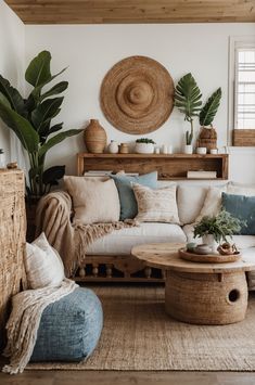 a living room filled with furniture and plants