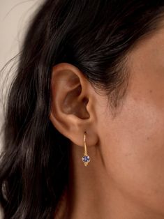 T A N Z A N I T E ∙ E A R R I N G S These earrings are crafted with 24k gold vermeil over 925 sterling silver. Each earring features an oval-cut tanzanite gemstone set in a sleek bezel setting, creating a stunning yet minimalist design. The vibrant blue-violet tones of the tanzanite catch the light beautifully, adding a touch of sophistication to any outfit.  This earring is also available in Peridot, Garnet, Amethyst, Citrine, Blue Topaz and Iolite Gemstones. Please write to us for customizations.  * Material: 24K Gold Vermeil on 925 Sterling Silver - Hypo-Allergenic and Nickel Free * Finish: 24K Gold Vermeil on 925 Sterling Silver | Also available in solid 925 Sterling Silver * Featuring 2 Pieces of 4*5 MM Oval natural Tanzanite gemstone. * Total Stone Weight: 0.65 Carats O T H E R ∙ I N Tanzanite Teardrop Earrings As A Gift, Tanzanite Birthstone Earrings As Gift, Tanzanite Birthstone Earrings For Gifts, Tanzanite Jewelry Set With Matching Earrings As Gift, Fine Jewelry Tanzanite Earrings For Gift, Handcrafted Silver Jewelry, Tanzanite Earrings, Bleu Violet, Tanzanite Gemstone