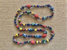 "This is a wonderful work of art to wear! Made in the 1980's by Marc Labat Paris, France. * Made of large, handmade glass beads * The glass beads are matte finish - not glossy * Length of necklace is 24\". There is no clasp, it simply slips on." Artisan Glass Beaded Necklace With Large Beads, Artisan Beaded Necklaces With Large Glass Beads, Artisan Large Recycled Glass Beads, Unique Large Glass Beads, Colorful Recycled Glass Beaded Necklaces, Artisan Beaded Necklaces With Recycled Glass Large Beads, Recycled Glass Beaded Necklaces With Colorful Round Beads, Large Glass Beads, Antique Jewelry Box