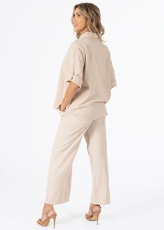 100% Cotton Imported from Peru Machine Wash Cold Modeled in size SM Model Measurements: Height 5’7”, Waist 25, Bust 31, Hips 33 Relaxed Fit Blouse With Roll-up Sleeves For Spring, Casual Beige Tops With Roll-up Sleeves, Spring Linen Tops With Roll-up Sleeves, Relaxed Fit Button-up Solid Bottoms, Neutral Cotton Button-up Blouse, Neutral Button-up Cotton Blouse, Linen Tops With Roll-up Sleeves, Beige Cotton Shirt For Daywear, Cotton Top With Roll-up Sleeves For Daywear