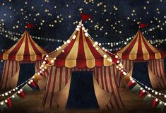 three circus tents with lights and stars in the sky