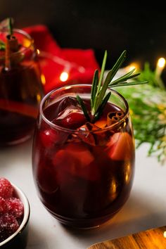 christmas sangria with cranberry and rosemary garnish