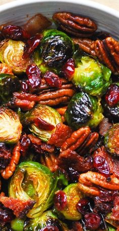 close-up of Roasted Brussels Sprouts with Bacon, Toasted Pecans, and Dried Cranberries in a bowl