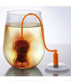 an orange cord connected to a glass filled with water