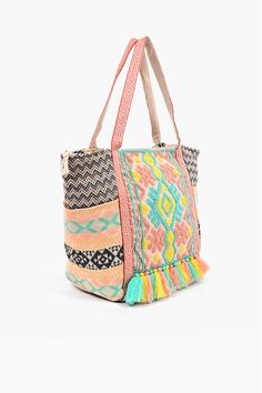 Have you ever wondered what it feels like to have your own personal rainbow accompanying you everywhere you go? Well, wonder no more! The Marbella Embroidered Tote is for those who like it subtle yet cheery, that sweet spot between these two widely different choices! This bag has a vibrant appeal with its luxurious patterned side panels, and rich hand embroidered detail in the front in pastel hues of coral. Versatile enough to be carried around just about anywhere, this bag is also effortless to Multicolor Embroidered Tote Bag For Vacation, Multicolor Embroidery Tote Bag For Vacation, Green Embroidered Vacation Bags, Multicolor Embroidered Travel Bag, Green Embroidered Bags For Vacation, Multicolor Embroidery Beach Bags, Embroidered Multicolor Travel Bag, Embroidered Green Bags For Vacation, Casual Pink Embroidered Bags