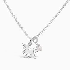 Do you have a magical little princess in your life? She will fall head-over-heels in love with her very own silver unicorn necklace. Created in solid sterling silver and accented with genuine cultured freshwater pearls - because, as we all know, unicorns (and their princesses) deserve only the very best. Hooray! Unicorns DO exist, and you just found one. [split] Details about your necklace: Sterling Silver Unicorn charms measures 12.5mm wide by 15.5mm tall (with ring) Every LGP chain necklace al Whimsical Silver Charm Necklace For Birthday, Silver Sterling Silver Charm Necklace With Pearl, Whimsical Silver Necklace For Birthday, Whimsical Sterling Silver Jewelry For Birthday, Whimsical Silver Jewelry For Birthday, Adjustable Silver Charm Necklace With Pearl, Adjustable Silver Pearl Charm Necklace, Toddler Bracelet, Unicorn Charm