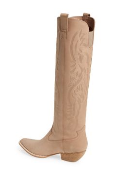 Tonal topstitching underscores the Western style of this knee-high leather boot finished with a tapered block heel and top pull-tabs for an easy-on fit. 2" heel (size 8.5) 17" shaft; 16" calf circumference Pull-on style Leather upper/leather and textile lining/synthetic sole Imported Leather Knee-high Boots With Snip Toe For Spring, Spring Leather Knee-high Boots, Western Style Fitted Knee-high Boots For Work, Knee High Leather Boots, Leather Boot, Jeffrey Campbell, Western Style, Knee High Boots, Western Fashion