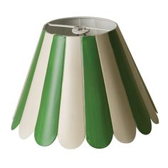 a green and white lamp shade on a white background