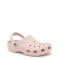 Fall in love with the step-in comfort of these unisex quartz (light pink) Classic clogs from Crocs. Made of lightweight, durable Croslite material in a molded design for long-term use, these easy-to-clean clogs have a pivoting heel strap for a perfect fit. Iconic Crocs Comfort system provides lightweight feel, flexibility, and 360-degree comfort. The ventilation holes on the upper allow to attach Jibbitz charms to personalize your look. (charms sold separately) | Crocs Women's Unisex Classic Clog in Quartz Size Women's 5/Men's 3 Medium Crocs Light Pink, Light Pink Crocs, Cool Crocs, Crocs Pink, Pink Crocs, Crocs Jibbitz, Women's Crocs, Birthday List, Birthday Wishlist