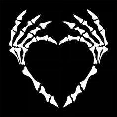 a heart made out of bones on a black background