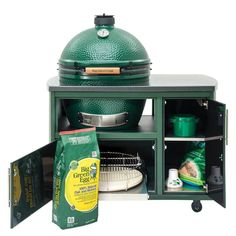 the big green egg is on display with other items