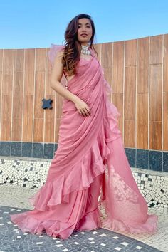 📌Hey! Please message us if you have any questions. We'll definitely assist you. a stunning Bollywood star designer ruffled saree, a pink trendy saree, a cocktail saree for an Indian wedding reception, and ready-to-wear stitched sarees Fabric: Saree - Georgette/ organza Blouse - georgette Color: pink Wash Care: Dry Clean <>Occasions:- Wedding, Special Wedding, Festival, Party, Traditional, Party Wear NOTE:- Product Color May Slightly Vary Due to Photographic Lighting Sources or Your Monitor Settings. NOTE:-Please Share Positive Feedback after the product is delivered. Important:- We are a company that makes clothes for women. In our store, we only offer Premium Quality Products. Don't thus compare our price to that of any other seller or website. Many thanks Do you want to see more product Silk Tops For Women, Sari Design, New Saree Designs, Choli Blouse, Ruffle Saree, Party Kleidung, Trendy Sarees, Saree Trends, Stylish Sarees