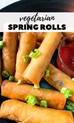 vegetarian spring rolls on a plate with dipping sauce