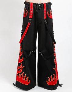 Dark Street pant in black with removable straps, adjustable ankles, D-rings, and deep pockets with embroidered flames on sides. WOMAN IS WEARING X-SMALLMAN IS WEARING MEDIUMSIZING BASED ON MENS FIT– Refer to Unisex Darkstreet Pant - Size Chart (Based on Men's Sizing)– Drawstring and adjustable waist buckles allow for a tighter fit on the waist– 100% Cotton.– Hand wash cold. Lay flat to dry. Heat Map Pants, Red Cybercore Outfit, Pink Grunge Outfit, Art Sona, Black And Red Pants, Embroidered Flames, Biker Outfits, Flame Pants, Fire Pants