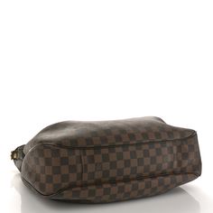 This is an authentic LOUIS VUITTON Damier Ebene Evora MM. The bag has a distinctive structure and is crafted of Louis Vuitton damier patterned canvas. This bag features brown leather handles, an optional shoulder strap, a front zipper pocket, brown leather trim, and gold hardware. The top zipper opens to a rouge red microfiber interior with patch pockets. Louis Vuitton Damier Ebene, Damier Ebene, Leather Handles, Authentic Louis Vuitton, Leather Trim, Leather Handle, Louis Vuitton Damier, Leather Trims, Front Zipper