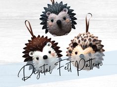 three stuffed hedgehogs hanging from hooks with the words digital felt pattern