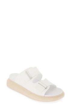 Streamlined bar hardware underscores the eye-catching look of a double-band slide sandal boasting a chunky platform and flexible jelly upper. 1 3/4" (44mm) heel; 1" platform (size 38.5) Synthetic upper, lining and sole Made in Italy Designer Shoes Modern White Leather Slides, White Slides With Buckle Closure For Spring, White Double Strap Footbed Sandals With Removable Insole, Modern Slides With Buckle Closure For Beach, Modern Beach Slides With Buckle Closure, White Leather Slide Footbed Sandals, Modern White Slides With Textured Footbed, White Platform Slip-on Slides, White Double Strap Slides For The Beach