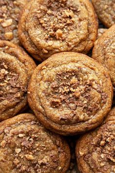 a pile of chocolate chip cookies sitting on top of each other