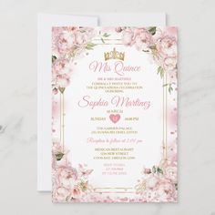 a pink and gold wedding card with flowers