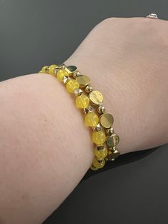 Set of 2 bracelets made with stretchy elastic and yellow and gold beads. Sizing may vary slightly. Cute Yellow Stretch Bracelet, Perfect As Gift, Yellow Beaded Stretch Bracelet, Yellow Stretch Bracelet With 8mm Beads, Yellow Spiritual Stretch Bracelet Hand-strung, Yellow Hand-strung Bohemian Stretch Bracelet, Gold Bead Bracelets, Heart Keychain, Stretchy Bracelets, Huggies Earrings