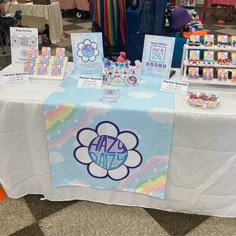 the table is set up with many items for children's birthdays and baby showers