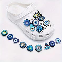 These are beautiful and cute evil eye protection jibbitz. Great for anyone of any age and especially babies who need protection without the risk of a jewelry peace.  Made from high quality PVC Material which is durable and long-lasting and wont deform. Easy to attach and remove. Measures about 2.5cm by 3cm. Standard size for all shoes.  Multiple buy discounts apply at the register.  🌲🌲Recycling Packaging🌲🌲 I aim to be environmentally-conscious in my packaging so I can reduce my business's carbon footprint to help combat climate change. I use recycled and upcycled paper and material where I can. This will allow our future generations to enjoy the beach and all the shells too just like we are today. Let's do the best we can! 📫📫This item does not come with a tracker via Australia Post. Cute Evil, Bubble Slides, Shoe Decorations, Slides Sandals, Decorated Shoes, Shoe Clips, Shoe Charms, Pvc Material, Etsy Baby