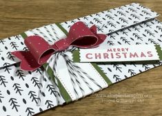 a christmas card with a bow on it