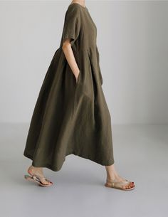 Sku CY-!121397 Material Cotton-blend Style Loose Feature Solid Color Neckline Round Occasion Going out , Casual , Vintage Seasons Spring, Summer, Autumn Type Maxi Dress Color Navy, Army Green, Apricot Size S, M, L, XL Size Chart: Please consult the size chart we provide for this item's measurements to help you decide which size to buy. Please note: There may be 1-3cm differ due to manual measurement. CM Bust Shoulder Sleeve Waist Hip Thigh Length One size / / / / / / / S 104 41 / / / / 118 M 108 Loose Midi Dress, Cotton Maxi Dress, Summer Linen Dresses, Linen Midi Dress, Short Sleeve Maxi Dresses, Flowy Maxi Dress, Round Neck Dresses, Midi Short Sleeve Dress, Cotton Maxi