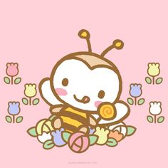 a cute little bee holding a candy in its hand and sitting on the ground next to flowers