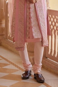 Flamingo pink raw silk sherwani with zardosi, french knots and aari embroidery. Comes with churidar, a kurta and a dupatta. - Aza Fashions Pink Kurta With Dori Work For Reception, Pink Dori Work Kurta For Reception, Pink Kurta With Chikankari Embroidery For Reception, Pink Chikankari Embroidery Kurta For Reception, Pink Bandhgala With Dabka Work, Chanderi Sherwani Straight Kurta For Reception, Chanderi Sherwani For Reception, Designer Chanderi Bandhgala With Dori Work, Pink Sherwani With Dabka Work For Eid