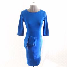 - Purchased This Dress On Amazon, The Brand Label Is Amikast - Size S, Runs Small And Fits Like A 2 - Deep Royal Blue Color - Round Collar - Elbow Length Sleeves - Origami Pleated Details At Waist - Back Zipper - Back Skirt Vent - Knee To Below The Knee Length Pencil Skirt Depending On Height - New With Tags, No Flaws Noted No Fabric Content Label; My Best Guess Is A Cotton, Polyester, And Spandex/Nylon Blend. Feels Like A Thick Knit Tee/Ponte Material With Stretch. Style Tags: Blue Office Dress Fitted Office Dresses With Pockets, Fitted Dress With Pockets For Night Out, Office Fitted Dress With Pockets, Blue Bodycon Midi Dress For Office, Blue Stretch Bodycon Dress For Work, Stretch Blue Bodycon Dress For Work, Blue Fitted Sheath Midi Dress, Fitted Blue Midi Dress For Work, Fitted Party Dresses With Pockets